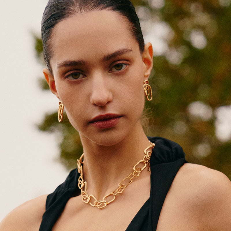 Roman Arc Golden Earrings